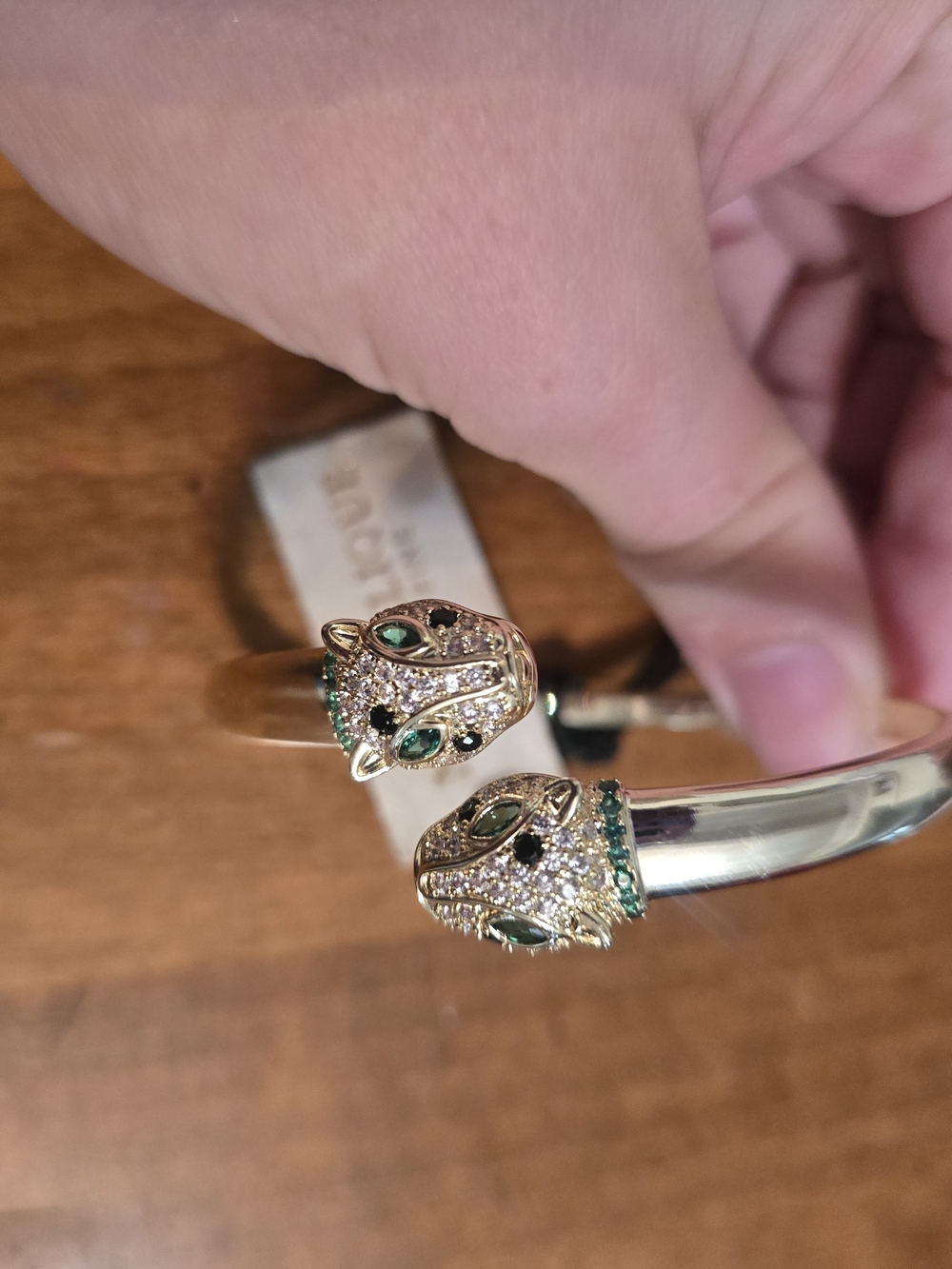 Gold-Tone Double Panther Head Cuff Bracelet with Green Accents